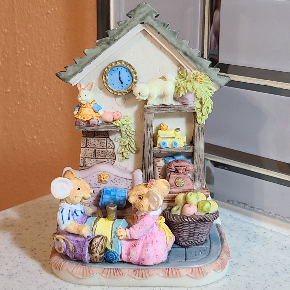 Two mice inside bed room super cute looks like ur looking inside a doll …